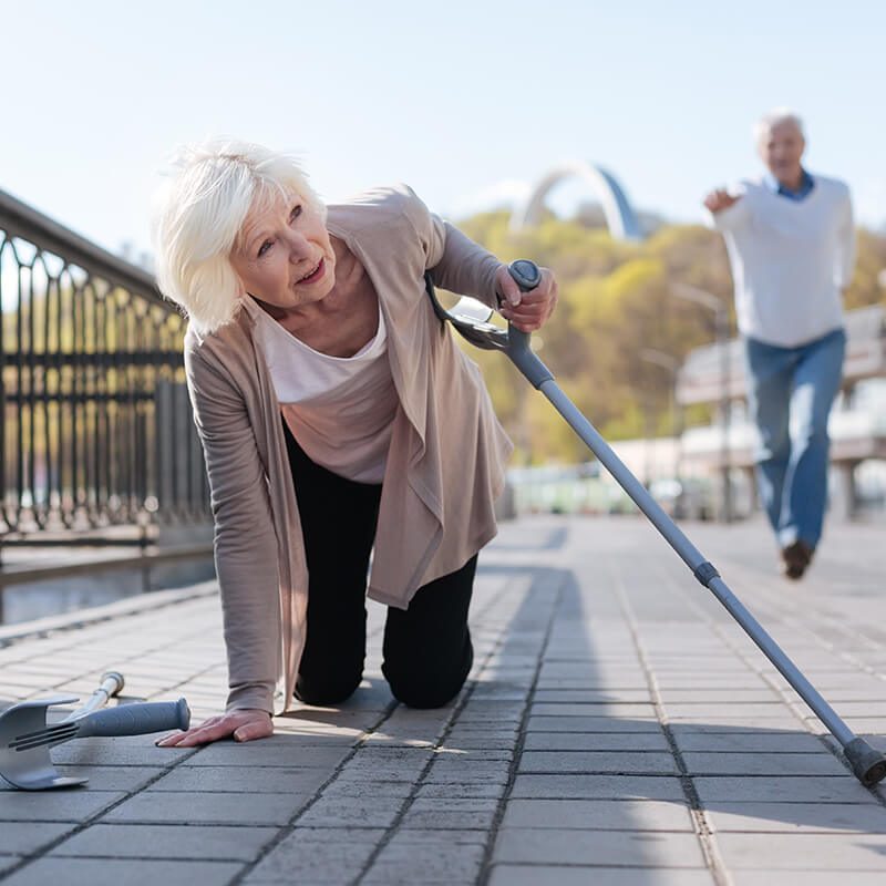 Fall Prevention Tips - an old lady fell down and a man behind her rushing to help